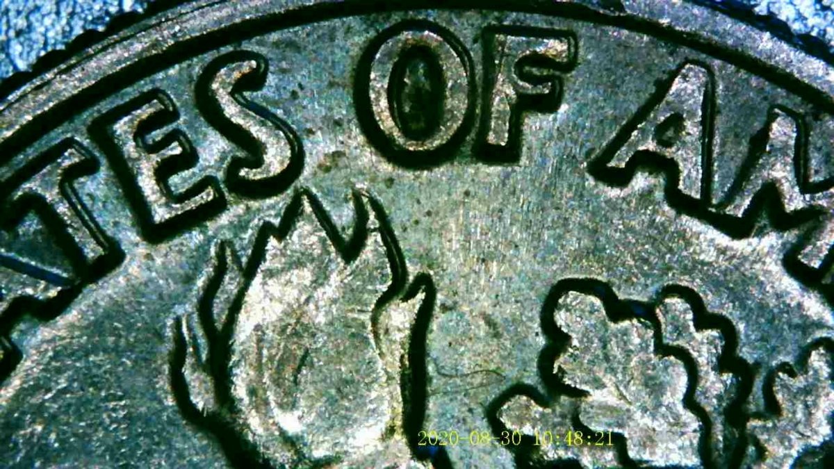 1982-P-Dime-DDR?-On-Torch-And-Letter.