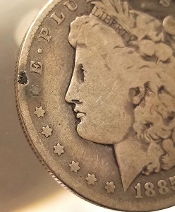 1885-Morgan-Dollar-Lamination-Chip-Or-Peeling