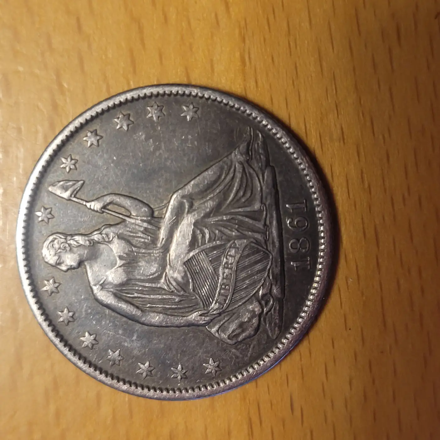 1861-O-Seated-Liberty-Half-Dollar-Worth-Grading?