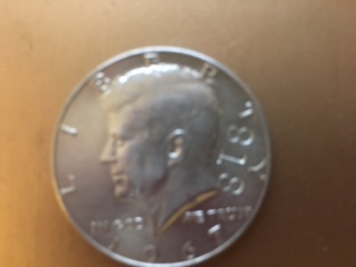 Please-Help!-1967-Uncirculated-Kennedy-Coin