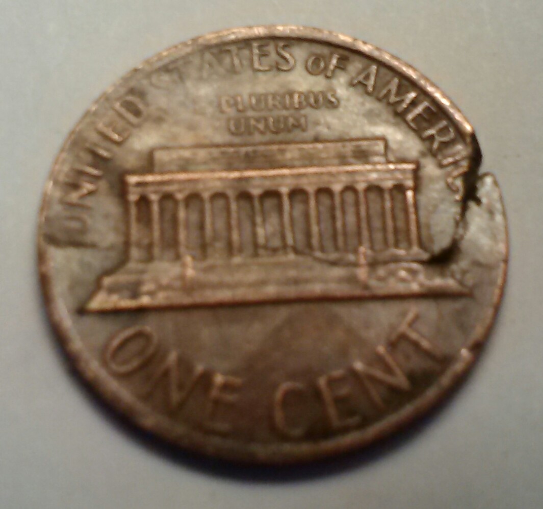 1980-P-LMC-Is-It-A-Lamination-Or-Post-Mint-Damage?