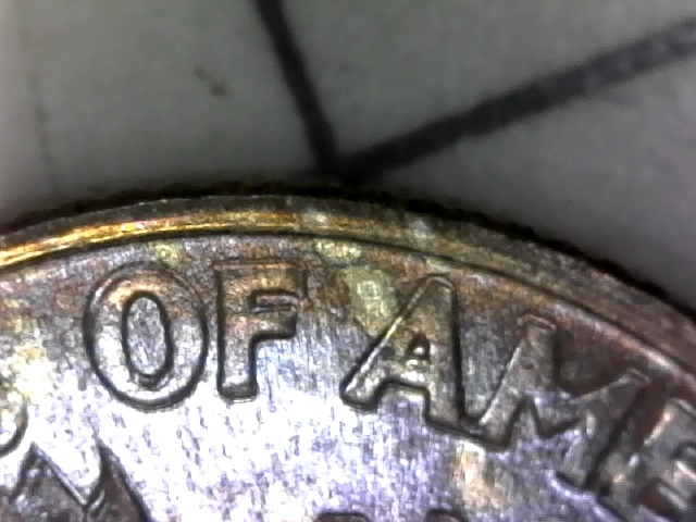 1964-Roosevelt-Dime-With-Multiple-Spreading-Of-Letters-In-The-Reverse.