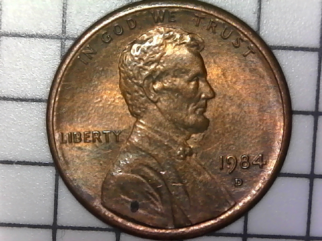 1984-D-Lincoln-Penny-With-Semi-Circular-Crack-In-Reverse.