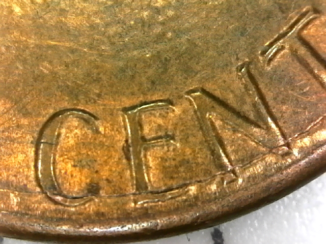 1984-D-Lincoln-Penny-With-Semi-Circular-Crack-In-Reverse.