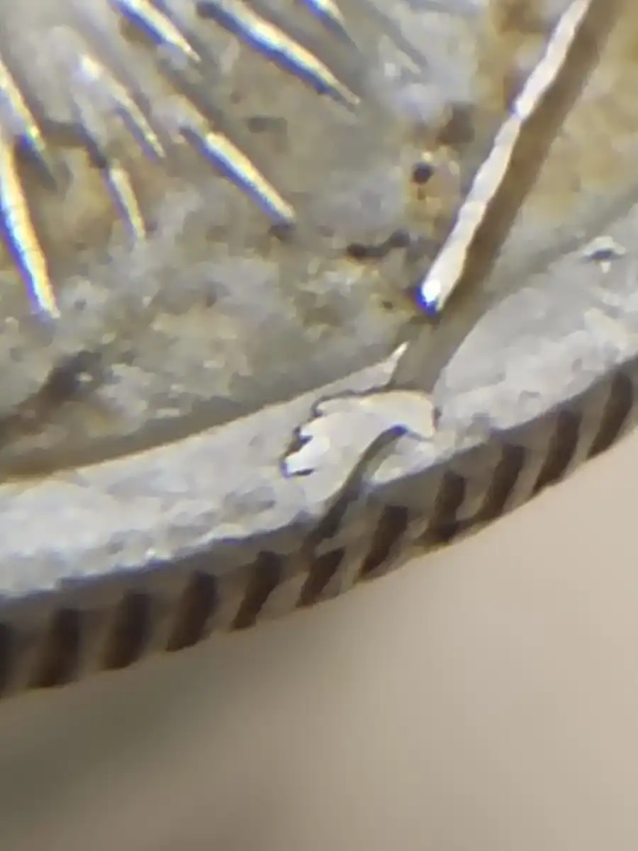 2001-5c-Coin-With-A-Line-Across-It
