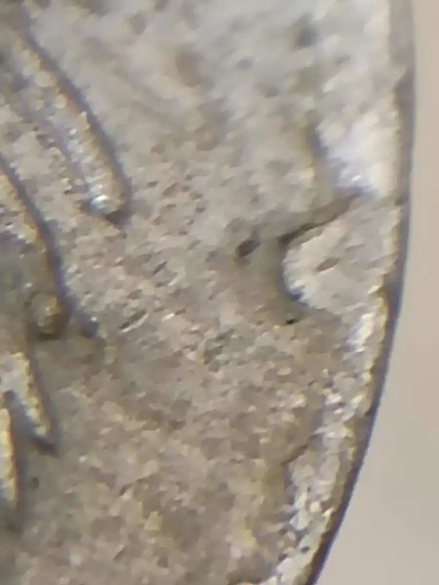 1975-5-Cent-Coin-With-Multiple-Blobs