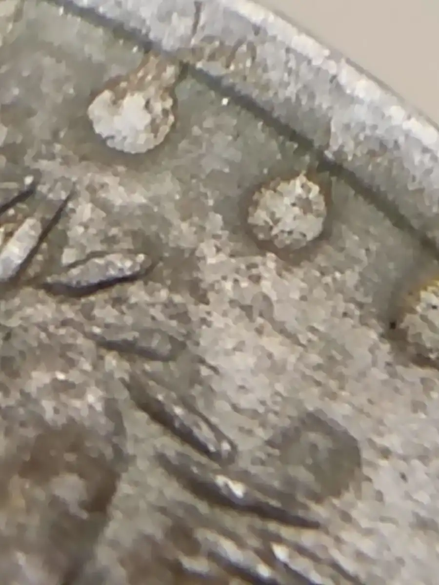 1975-5-Cent-Coin-With-Multiple-Blobs