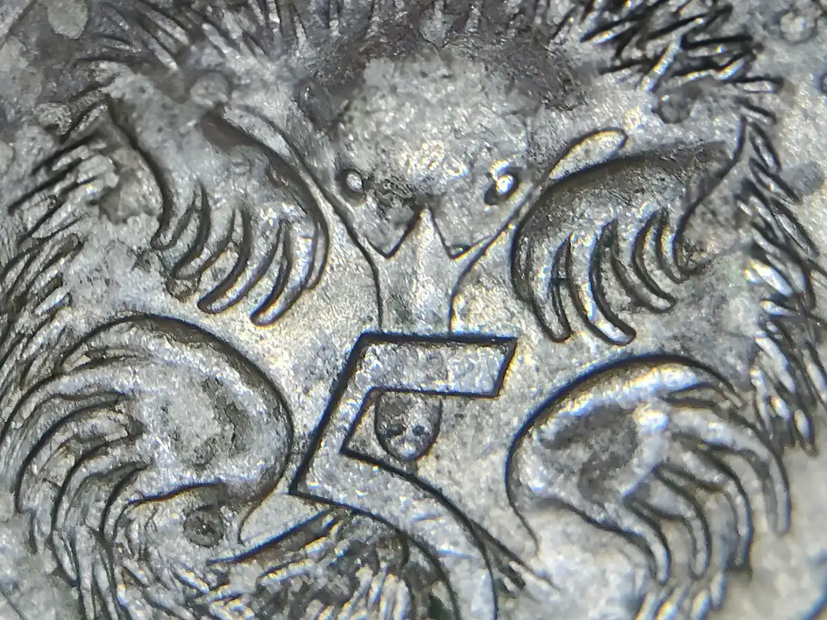 1975-5-Cent-Coin-With-Multiple-Blobs