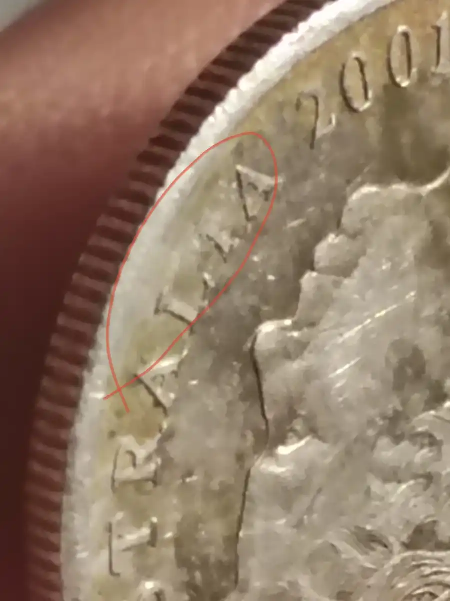 2001-5c-Coin-With-A-Line-Across-It