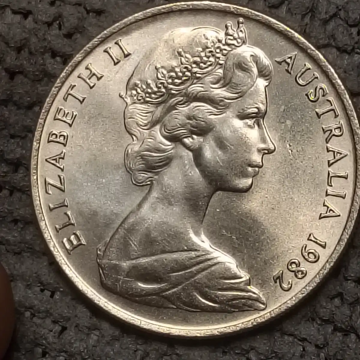 1982-10-Cent-Coin-Acne-Queen