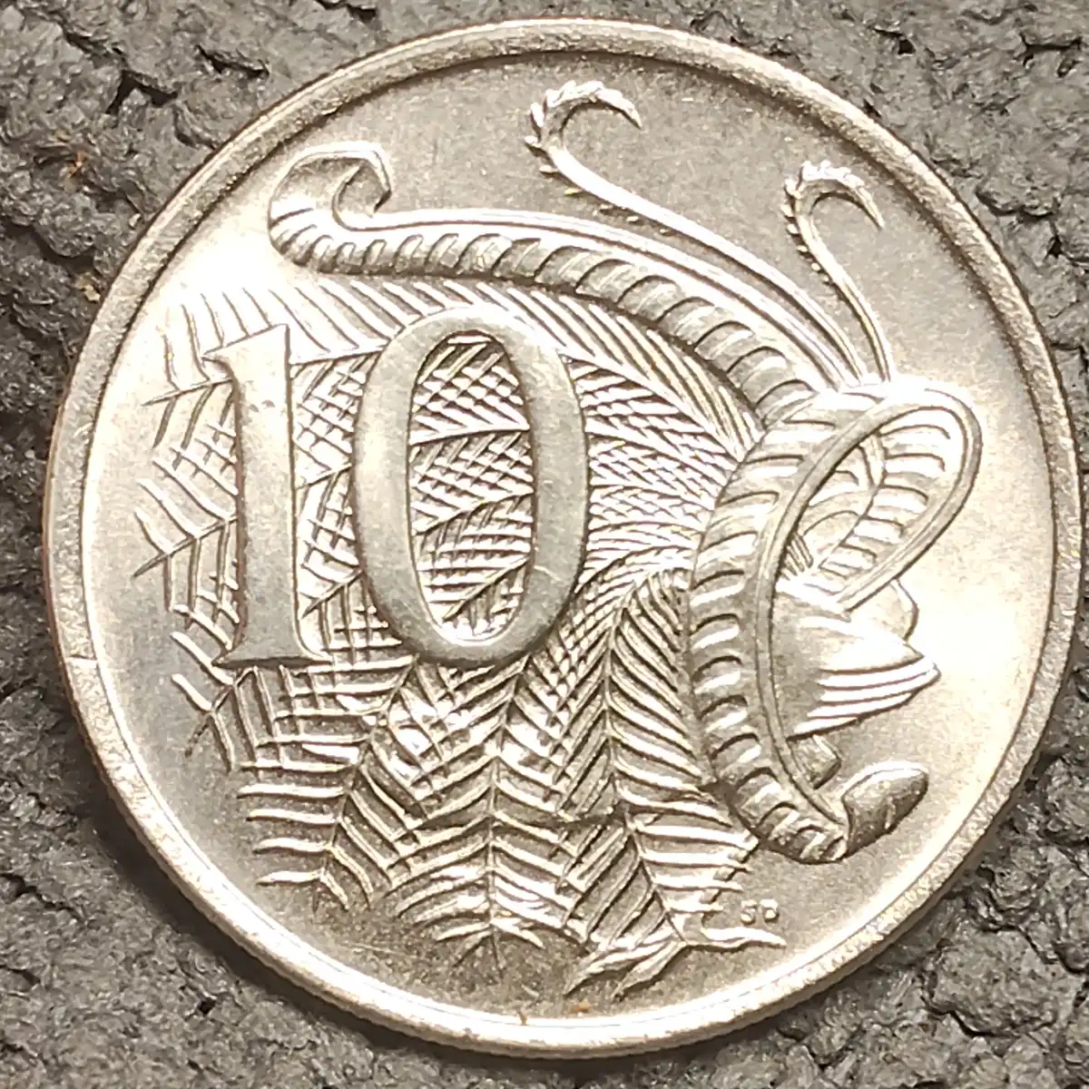 1982-10-Cent-Coin-Acne-Queen