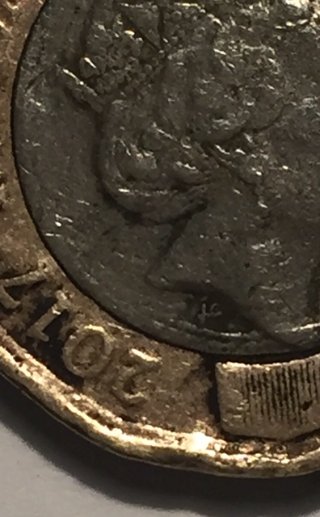 A-Couple-Of-GB-£1-Coins-With-Errors