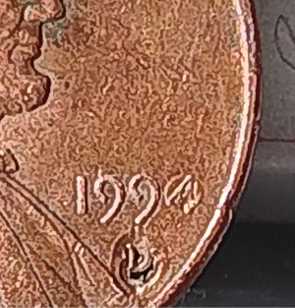 1990-Penny-Over-1994-D-Mint-Smash-In