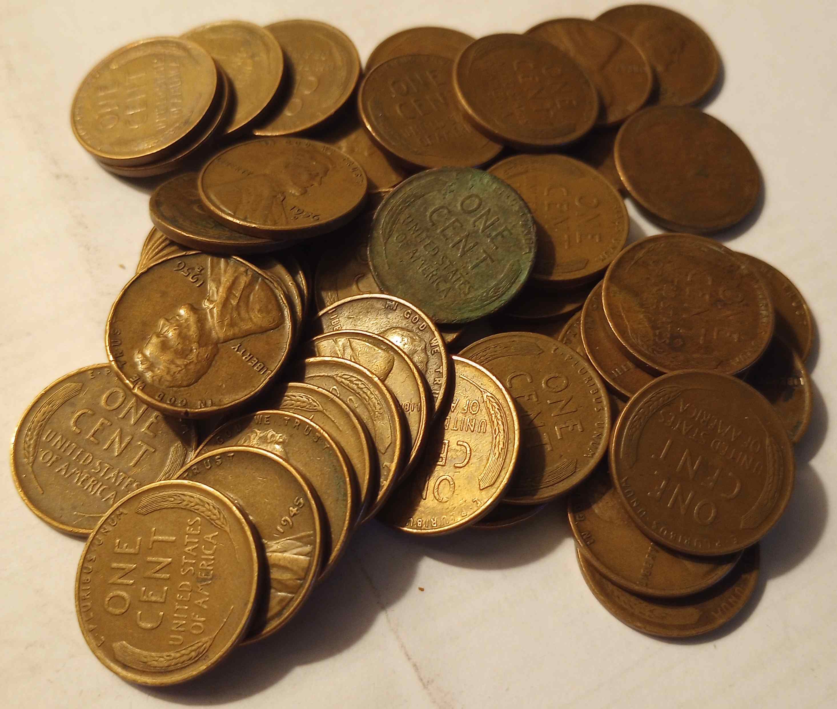 Collection-Of-Wheat-Pennies-And-SBA-Dollars