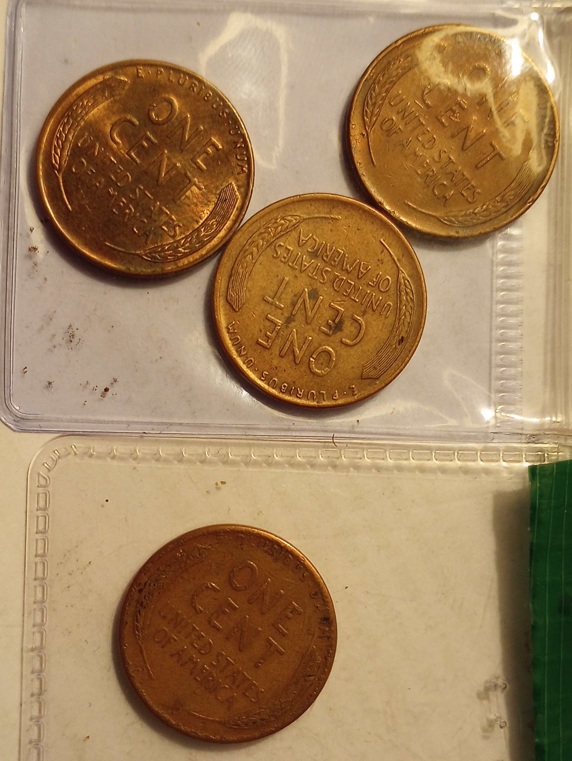 Collection-Of-Wheat-Pennies-And-SBA-Dollars