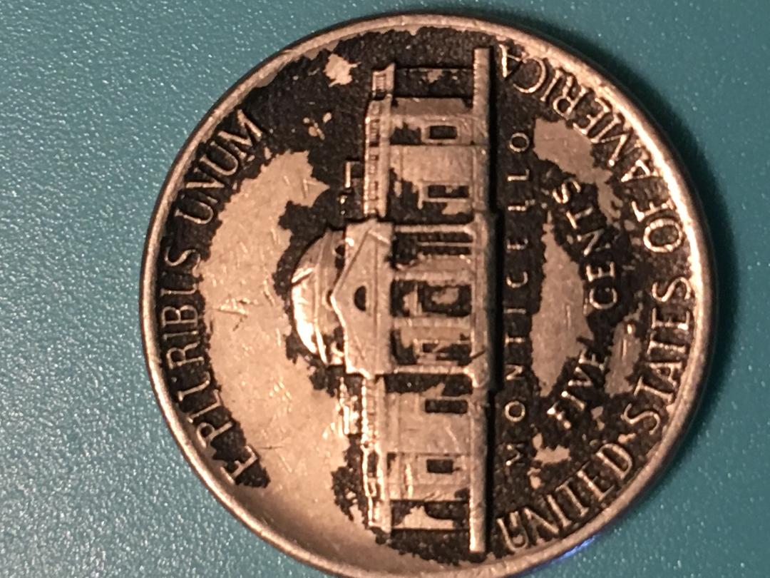 Awesome-Front-And-Back-Of-A-1984-D-Black-Coated-Nickel