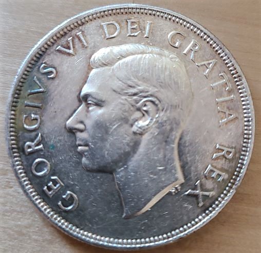 Help-With-Authenticating-This-1948-Silver-Dollar?