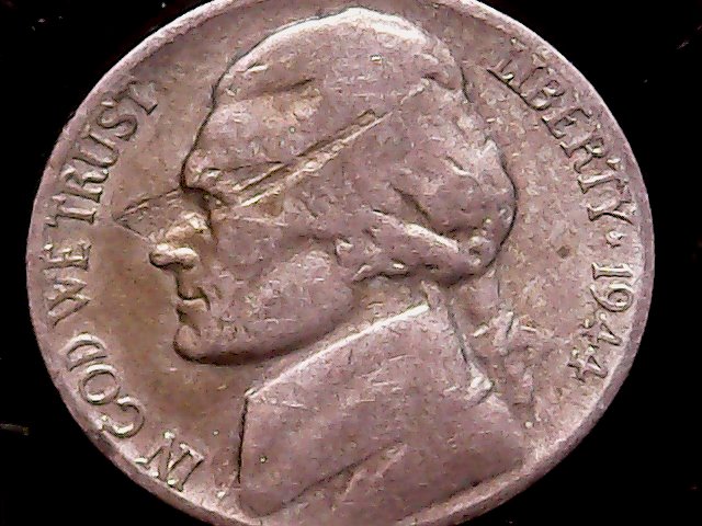 1944-S-War-Nickel-W/Rifle-Shaped-Strike-Through-Error.