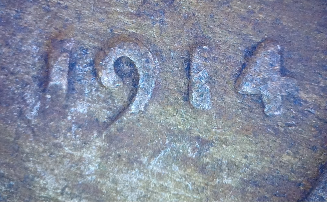 1914-Wheat-Penny.--Yes-Pareidolia.-But-Tell-Me-You-Don't-See-It