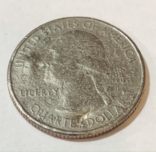 2014-Utah-State-Quarter-Struck-Through-Grease?