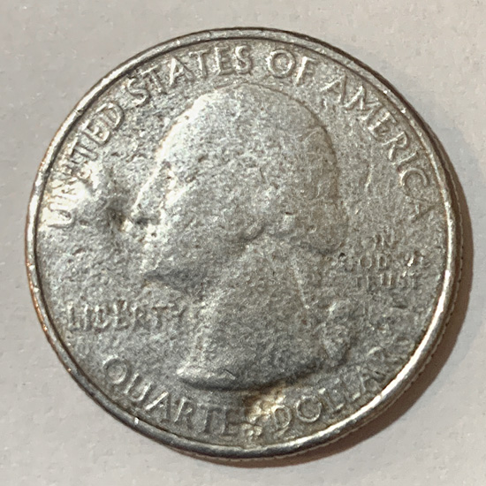 2014-Utah-State-Quarter-Struck-Through-Grease?