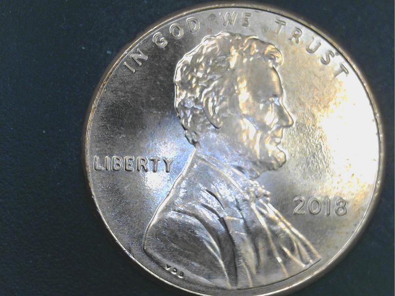 2018-Penny-Mark-Next-To-The-Ear-What-Is-It?