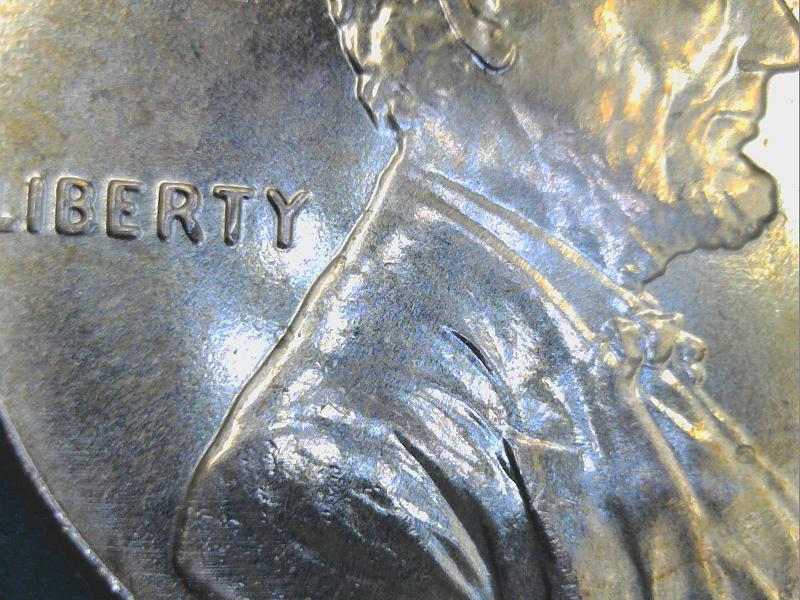 2018-Penny-Mark-Next-To-The-Ear-What-Is-It?