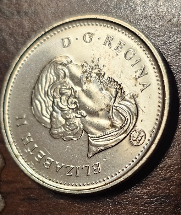 2007-Nickel-Struck-Through-Retained-Resin/Plastic?