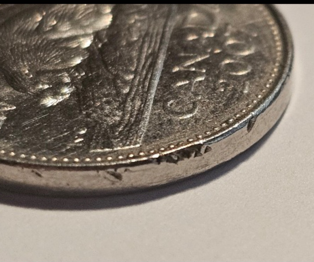 2007-Nickel-Struck-Through-Retained-Resin/Plastic?