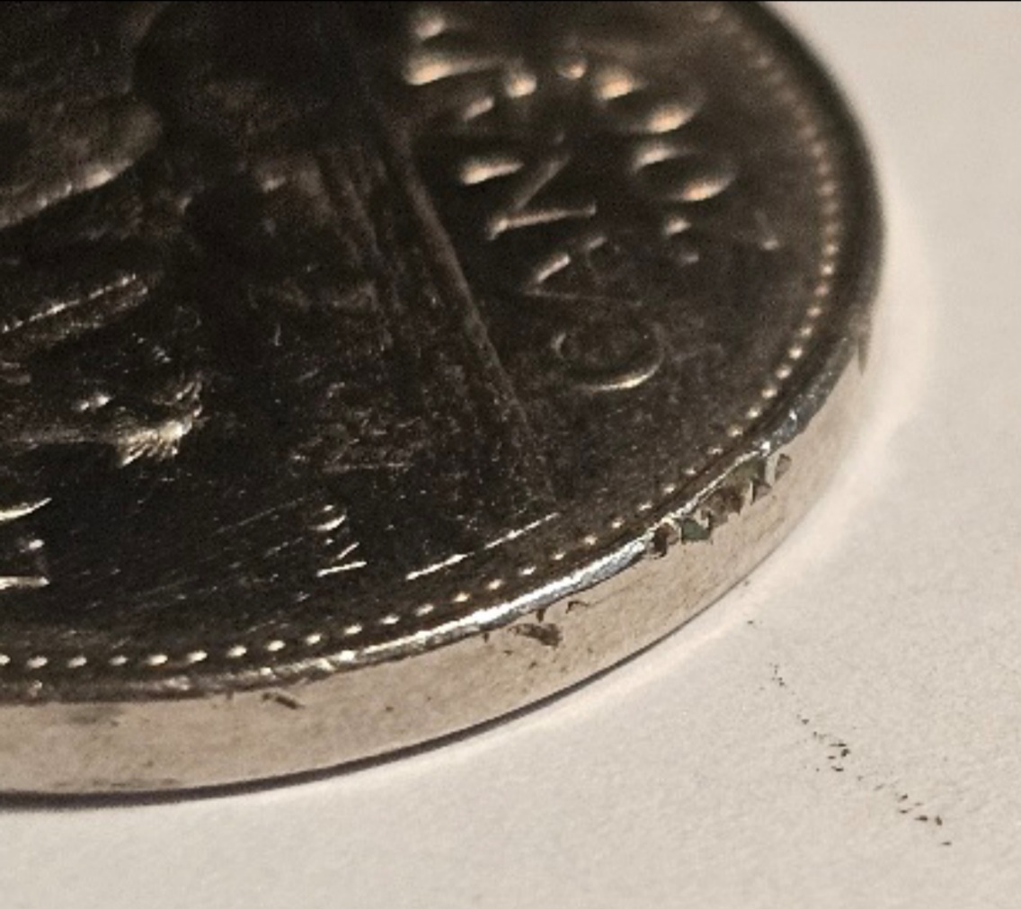 2007-Nickel-Struck-Through-Retained-Resin/Plastic?