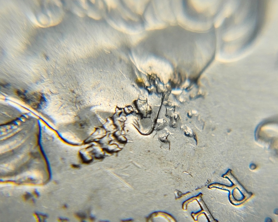 2007-Nickel-Struck-Through-Retained-Resin/Plastic?