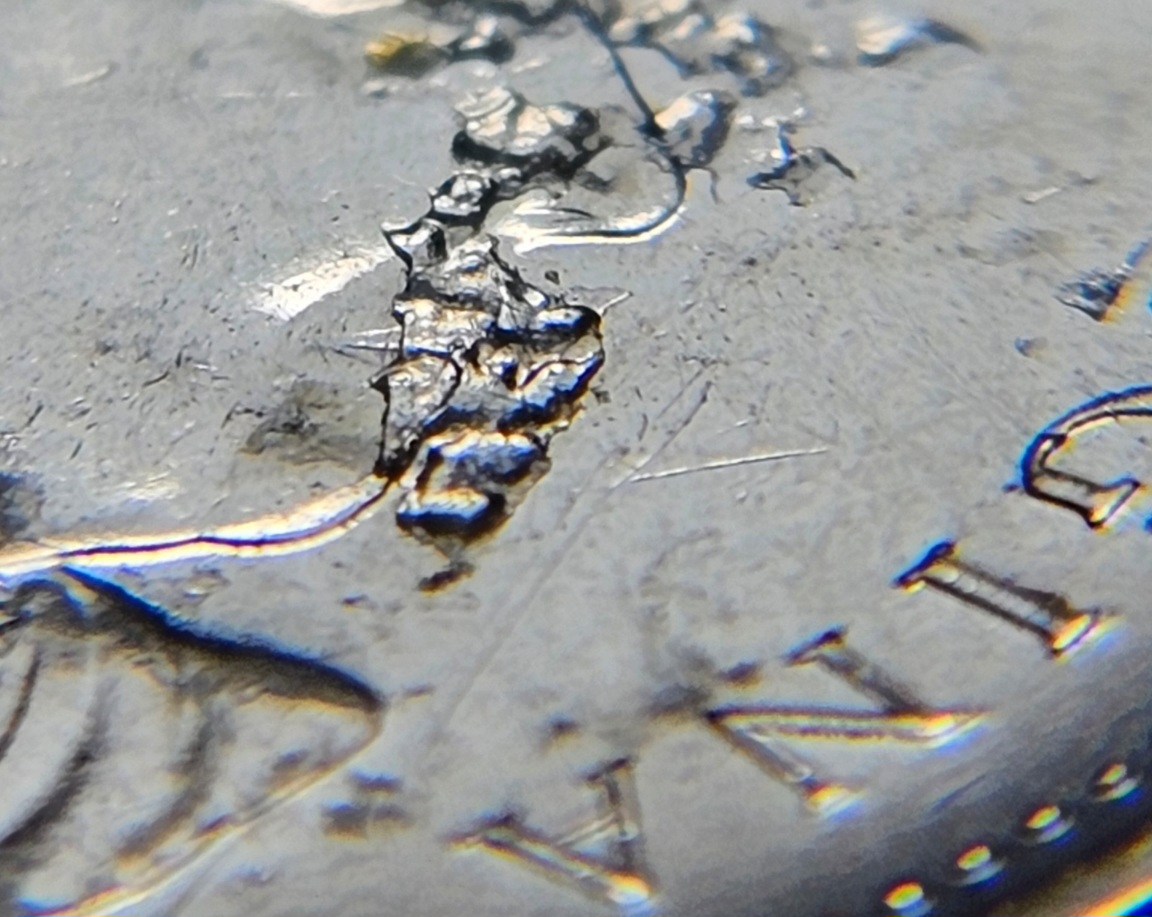 2007-Nickel-Struck-Through-Retained-Resin/Plastic?