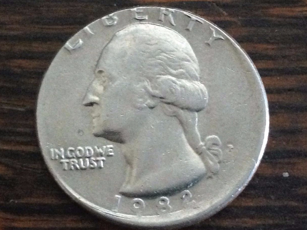 1982-Quarter-Miss-Stamp?-Off-Center-Strike