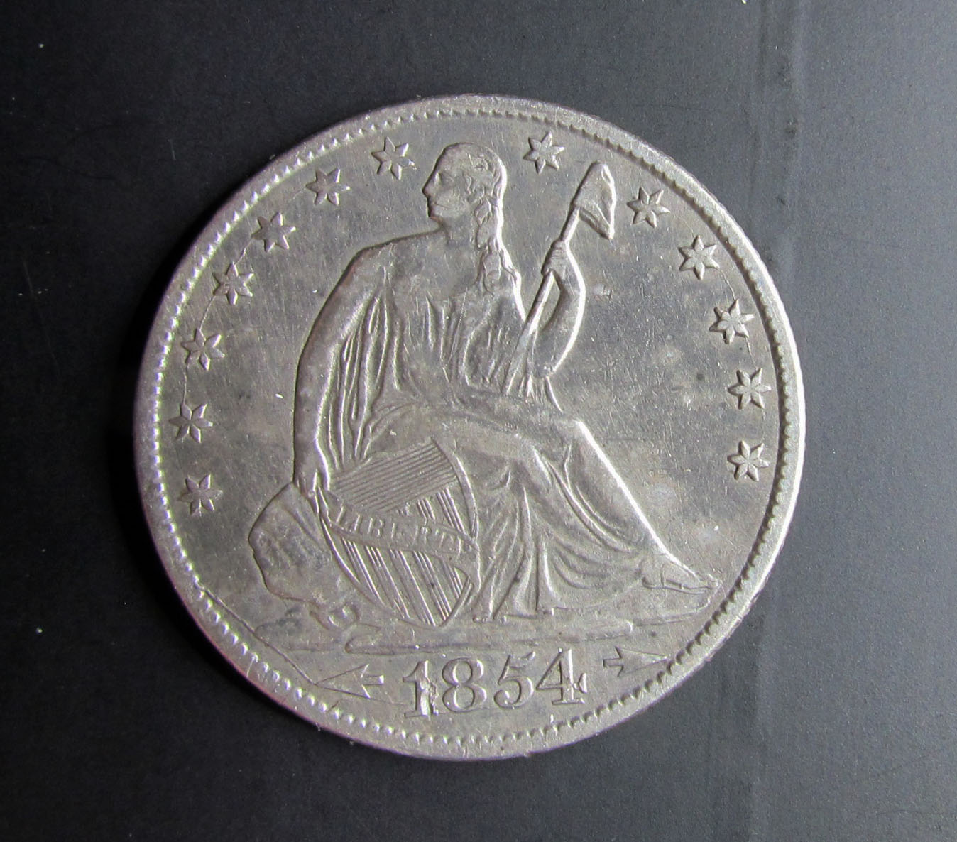 1854-O-Seated-Liberty-With-Die-Cracks-And-Die-Fragment?
