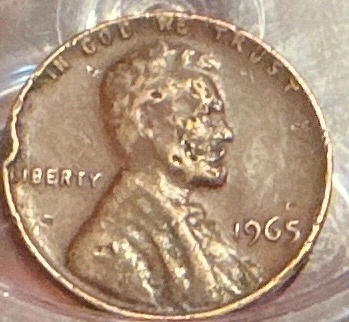 Post-Mint-Damage-Vs-Strike-Error-On-1965-Penny?