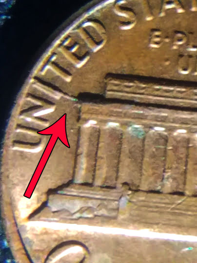 1983-Penny-With-Melted-8-And-A-Possible-Crack-In-The-Back.