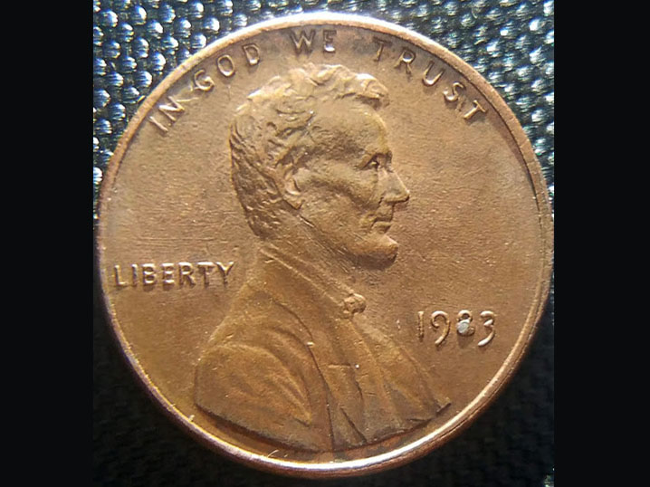 1983-Penny-With-Melted-8-And-A-Possible-Crack-In-The-Back.