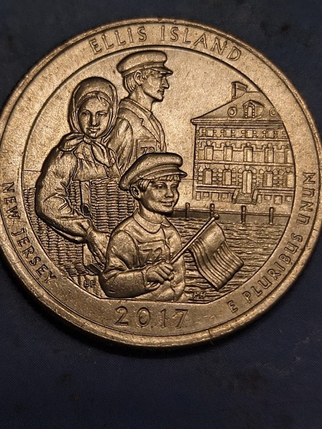 2017--Ellis-Island-Quarter-.-Half-Letter-Missing--Or-It-Is-A-Hit.-?