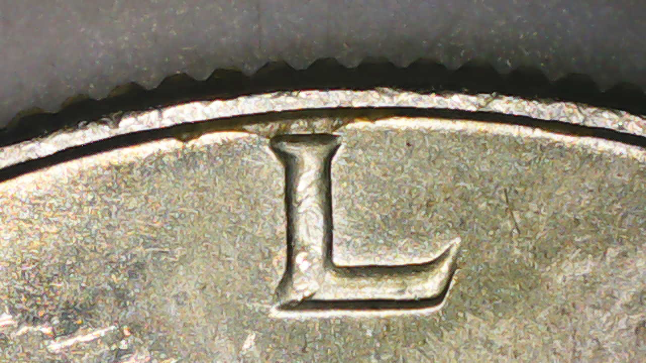 1969-D-Half-Dollar-Strike-Though-Glue-Or-Wax