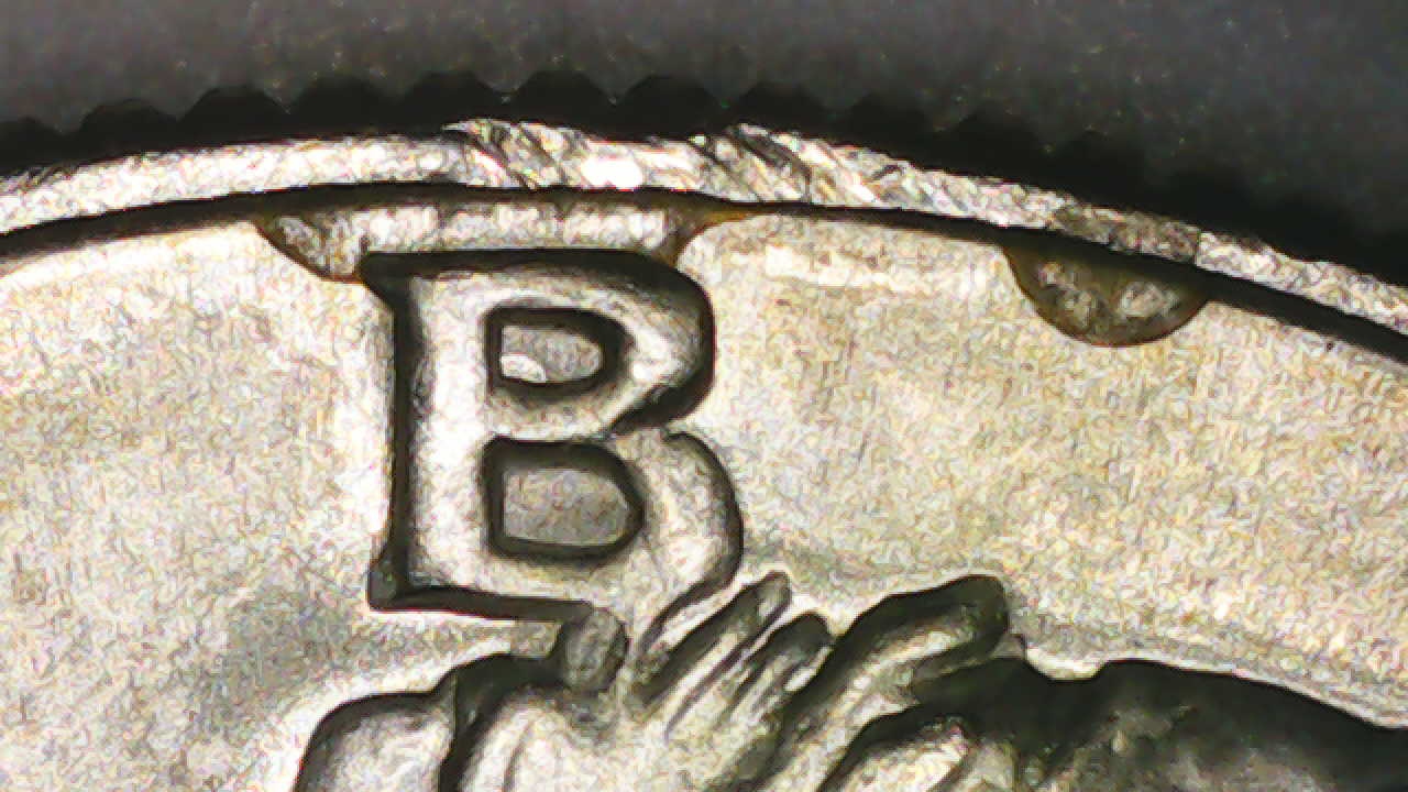 1969-D-Half-Dollar-Strike-Though-Glue-Or-Wax