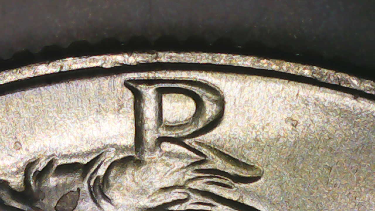 1969-D-Half-Dollar-Strike-Though-Glue-Or-Wax