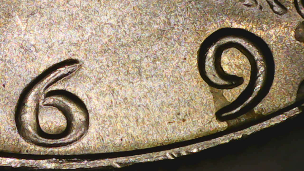 1969-D-Half-Dollar-Strike-Though-Glue-Or-Wax