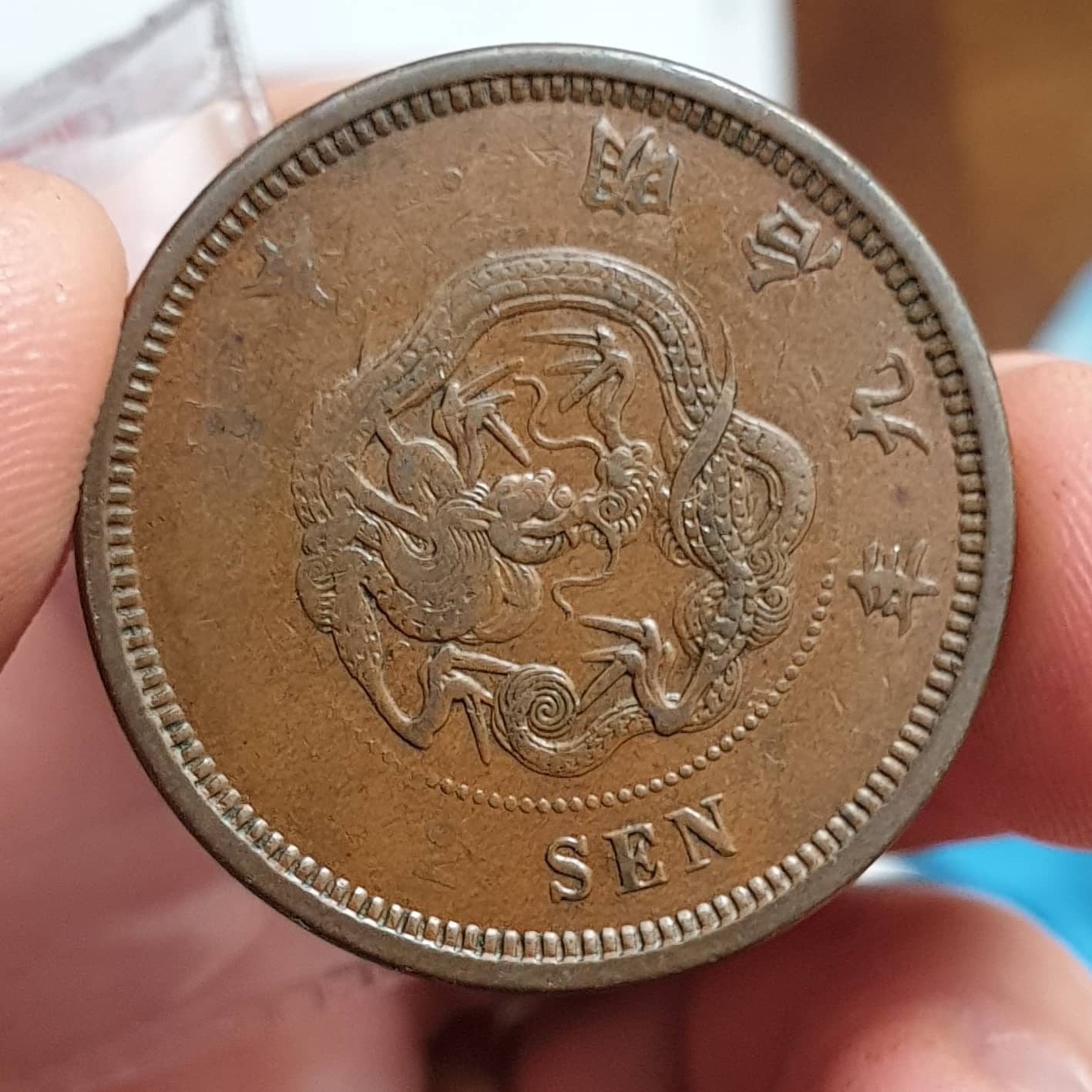 Japan-1876-2-Sen-Struck-Thru-A-Whole-Lot-Of-Something
