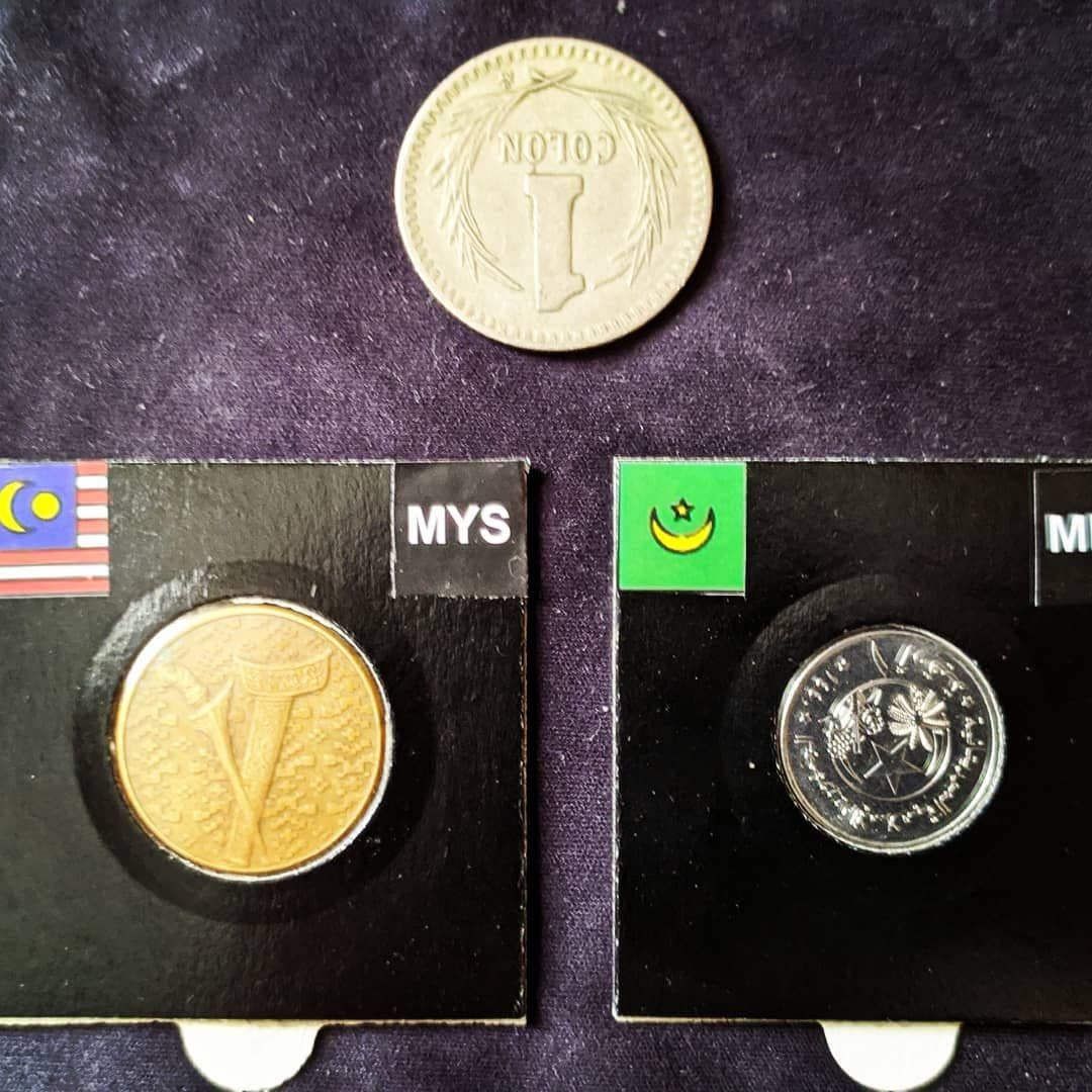 Trying-To-Collect-$1-Coins-From-Around-The-World