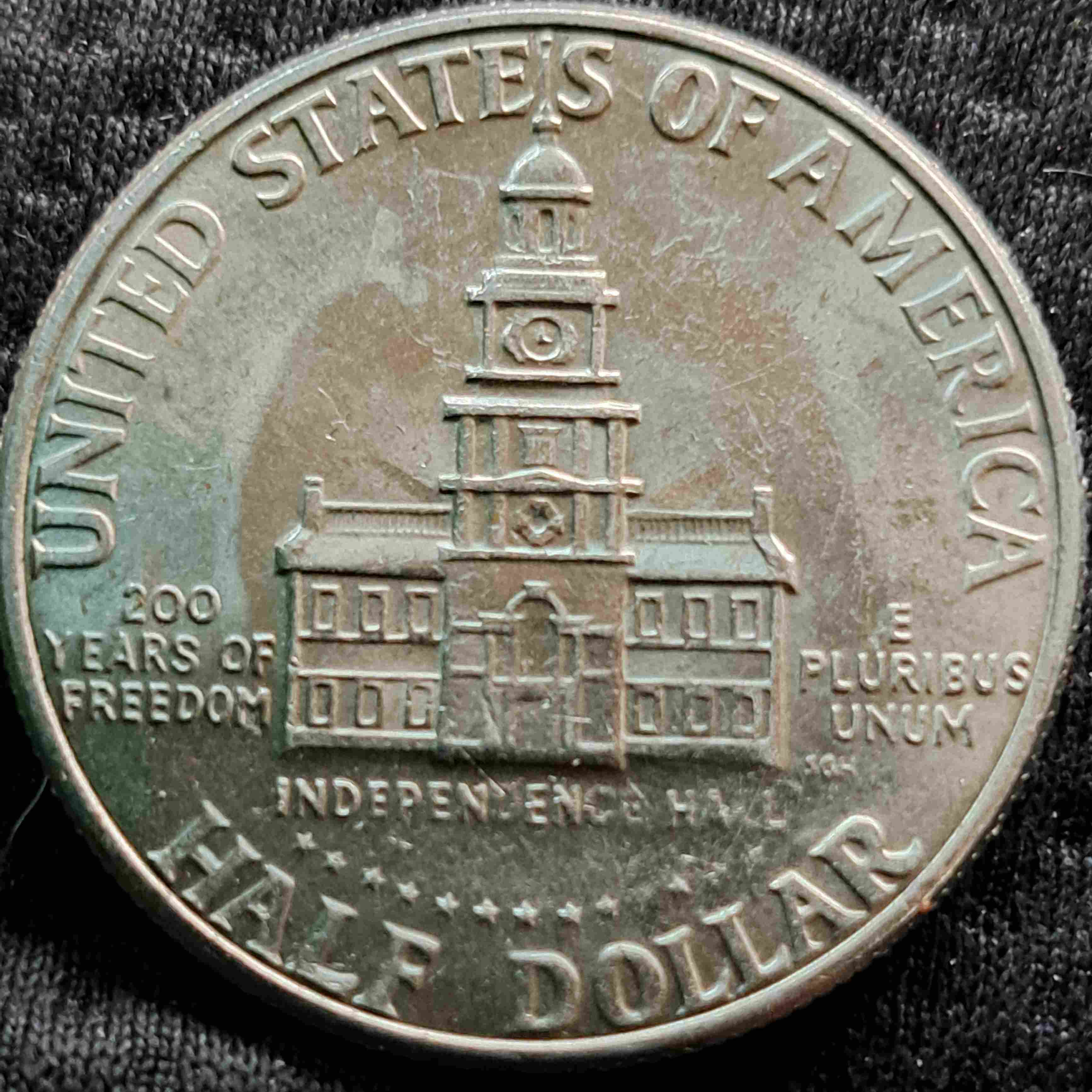 1776-1976-Kennedy-Half-Dollar-Error-On-The-Back