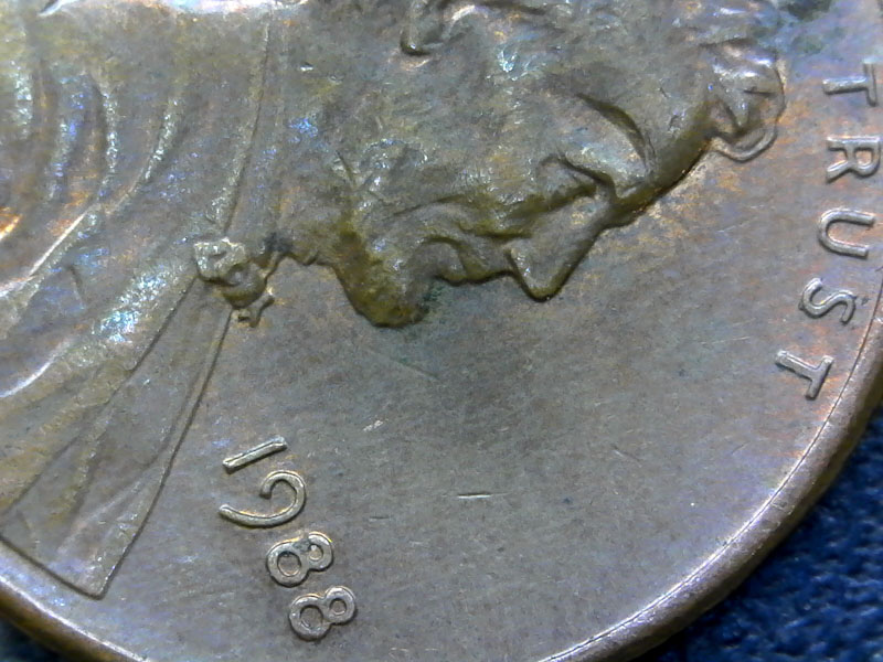 1988-Lincoln-Memorial-Cent-Is-Lamination-Error-Over-The-Eye?-Or-Is-Damage?