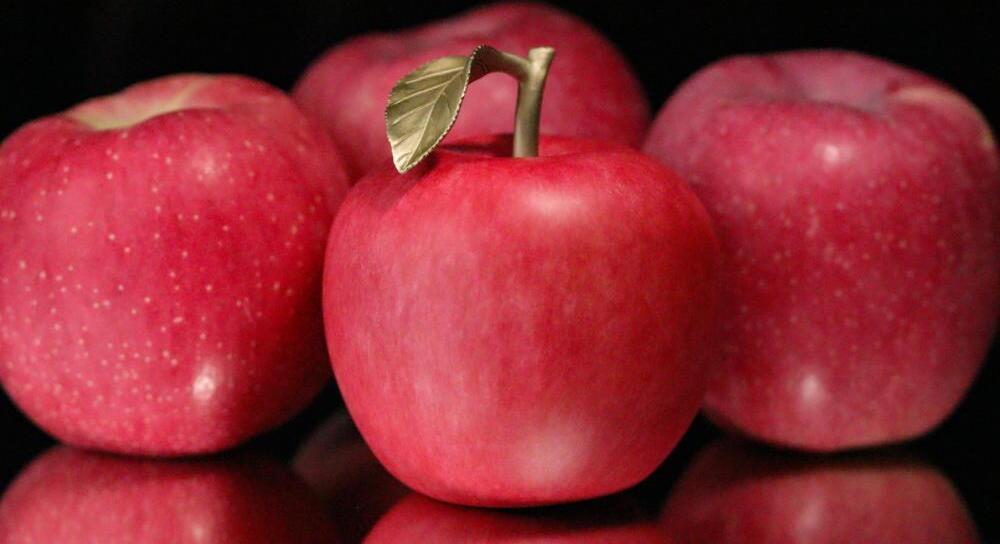 How-Can-An-Object-Shaped-Like-An-Apple-Be-Considered-A-Coin?