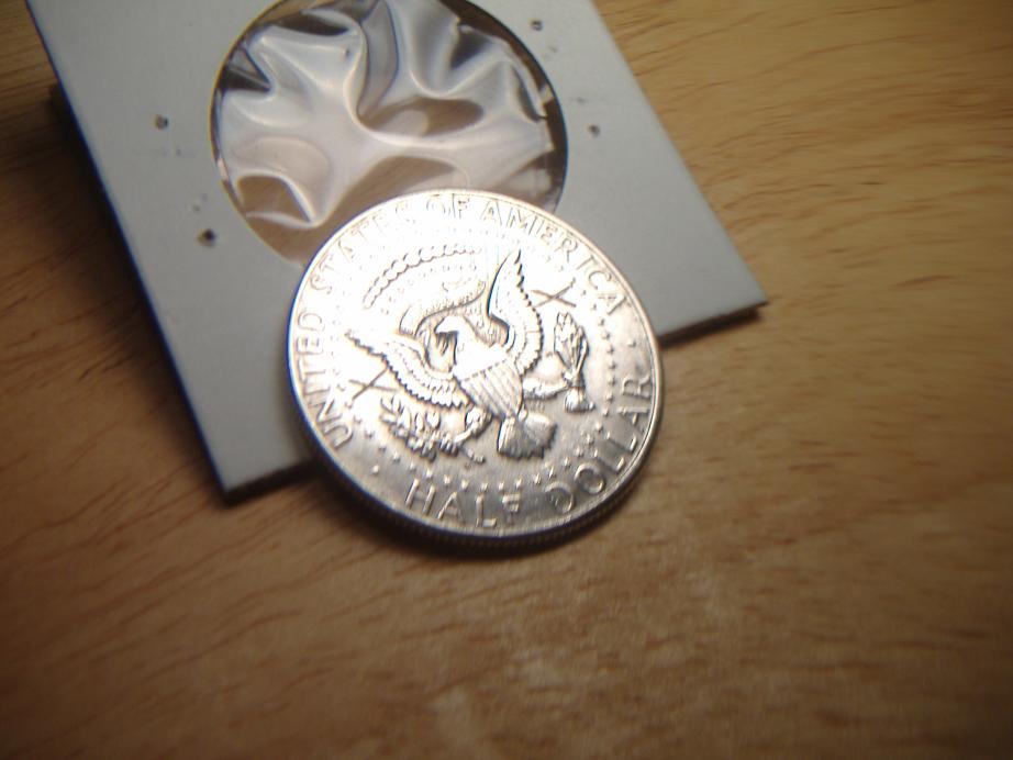 1964-D-Kennedy-Half-Dollar-With-Xs-On-It.-Error?