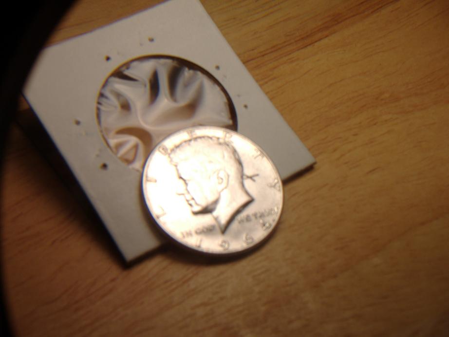 1964-D-Kennedy-Half-Dollar-With-Xs-On-It.-Error?