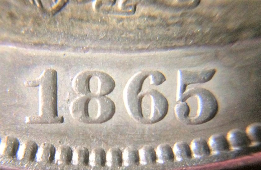 1865-Seated-Liberty-50c---MPD?